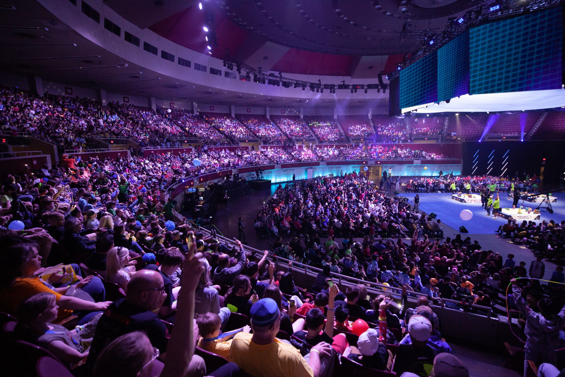 A packed arena at a robotics competition